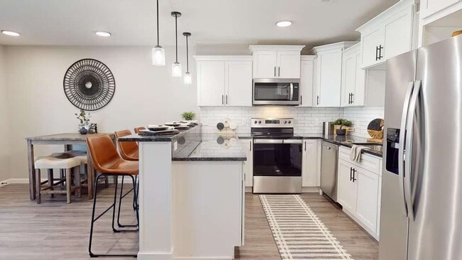 Building Photo - The Woods Townhomes