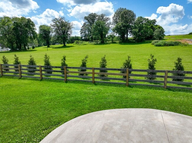 Building Photo - unning custom-built home on a full acre in...