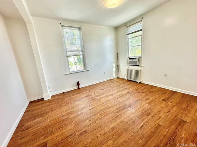 Building Photo - 18-17 125th St