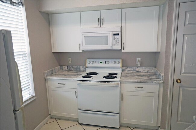 Building Photo - 9018 Lake Chase Island Way