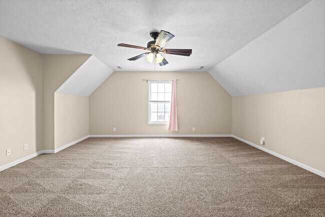 Building Photo - Pet Friendly Three Bedroom with Bonus!