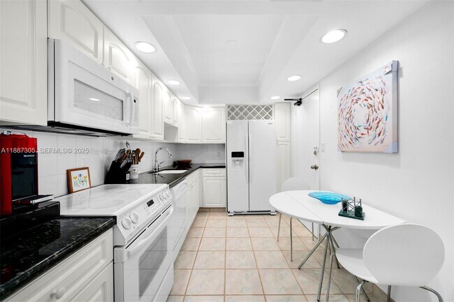 Building Photo - 10185 Collins Ave