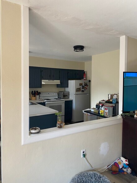 Open view into kitchen from living room. - 500 Campbell Cir