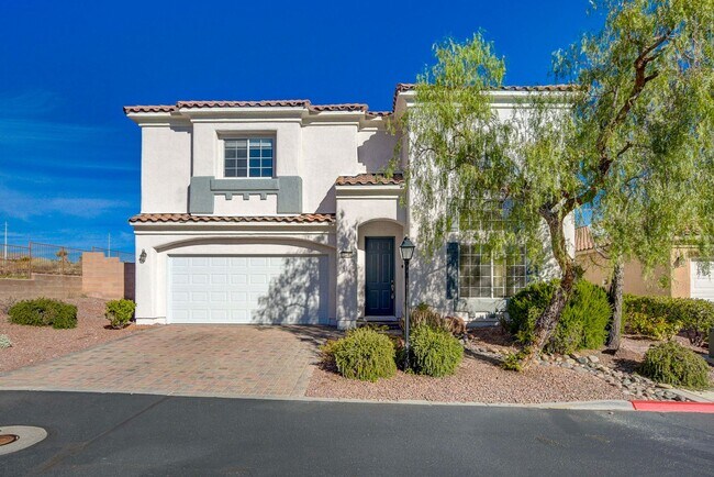 Building Photo - THIS 2 STORY HOME IN A GATED COMMUNITY HAS...