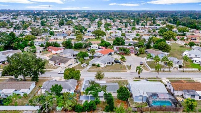 Building Photo - JUTS REDUCED!!!   3/1.5/1 1113 Sq. Ft. with UPDATED bathrooms and kitchen with GRANITE, LARGE bac...