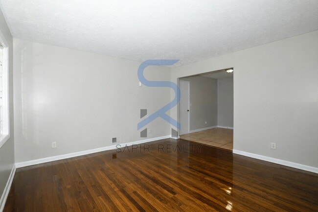 Building Photo - Timeless All-Electric Ranch Charm in a Vibrant, Peaceful Corner of South River Gardens