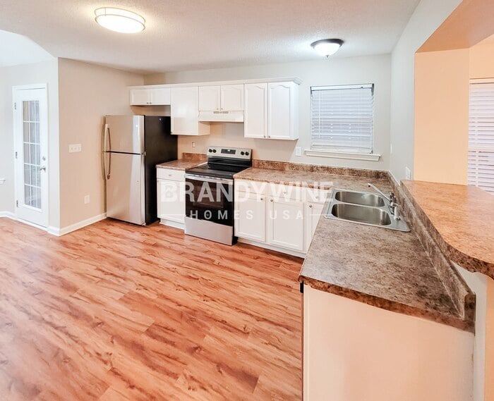 Building Photo - 3962 Sunset Lake Cove