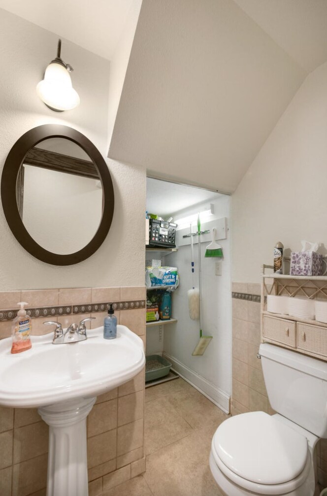Half bath with storage (main floor) - 6324 W Wells St