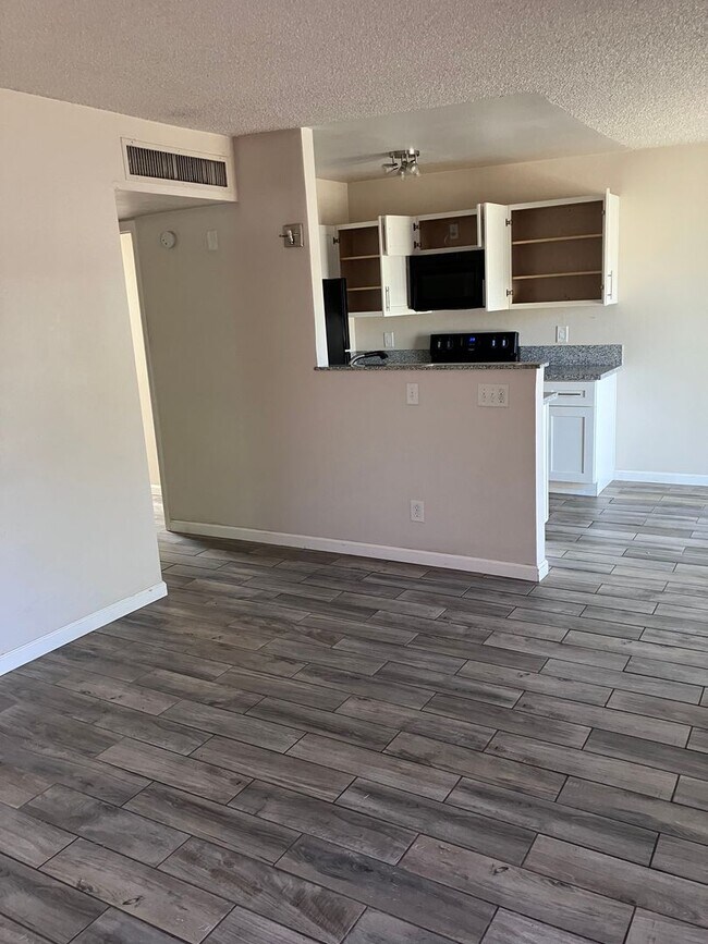 Building Photo - Available Now! Ask for our Specials!