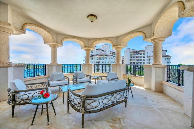 Building Photo - 7154 Fisher Island Dr