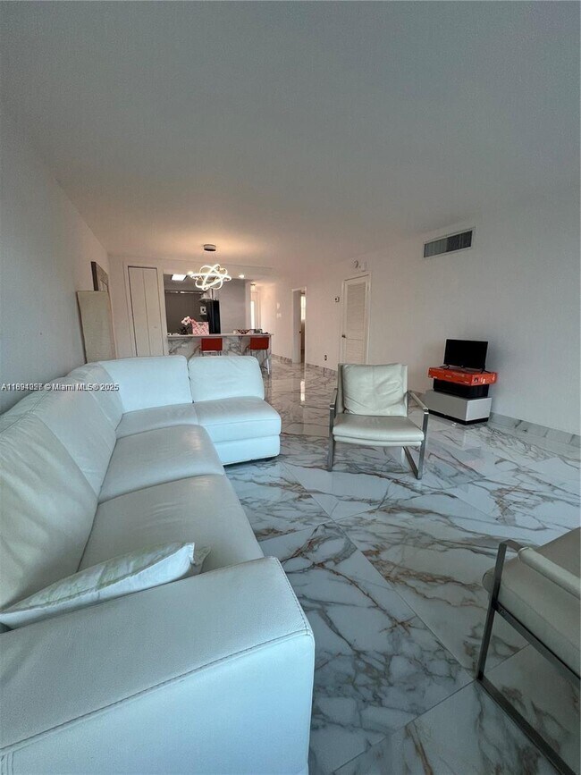 Building Photo - 10240 Collins Ave