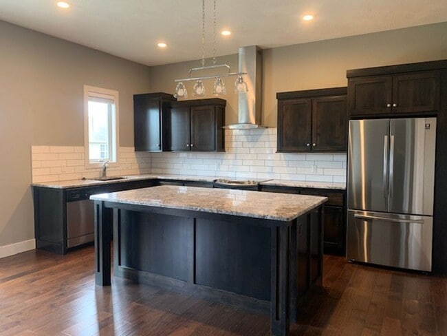 Building Photo - Beautiful Open Layout 3 Bedroom 2 Bath 3 Car Garage NIXA