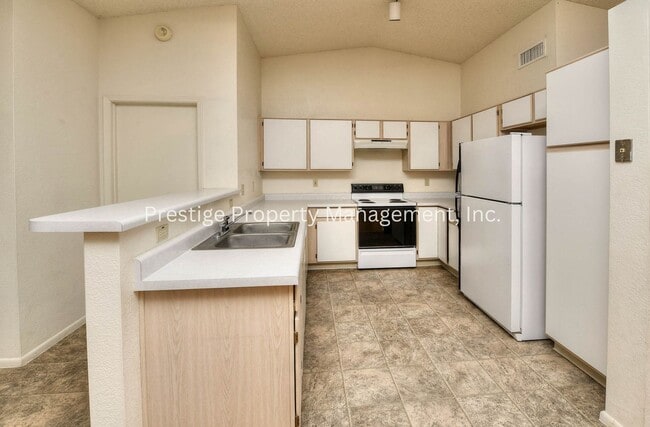 Building Photo - 3/2 Beautiful Rita Ranch Home With Open Design!!!