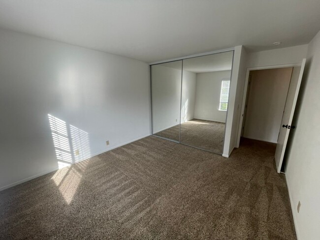 Building Photo - Large three-bedroom condo with huge Living...