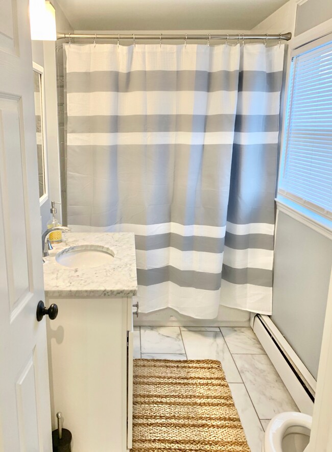 Full bath with tub-shower - 840 E Broadway