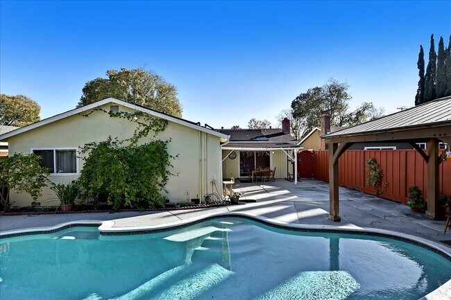 Building Photo - Beautifully Updated Single Family Home with Sparkling Pool