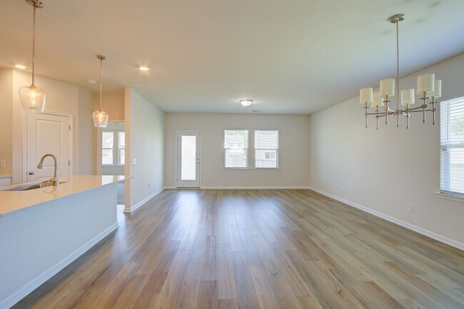 Building Photo - Spacious 4BR Rental with Stunning Kitchen & Covered Patio