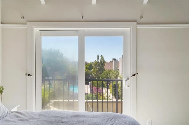 Building Photo - Spacious 1,550 Sq Ft Townhome | 2-Car Garage & High Ceilings w/ Exposed Beams