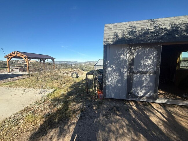 Building Photo - 4BR/2BA HOME w/ attached garage, usable land, fenced in back yard in CAMPO available!