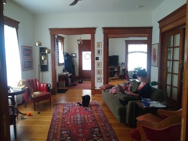 Living room looking into parlor and entryway - 1131 Lexington Ave