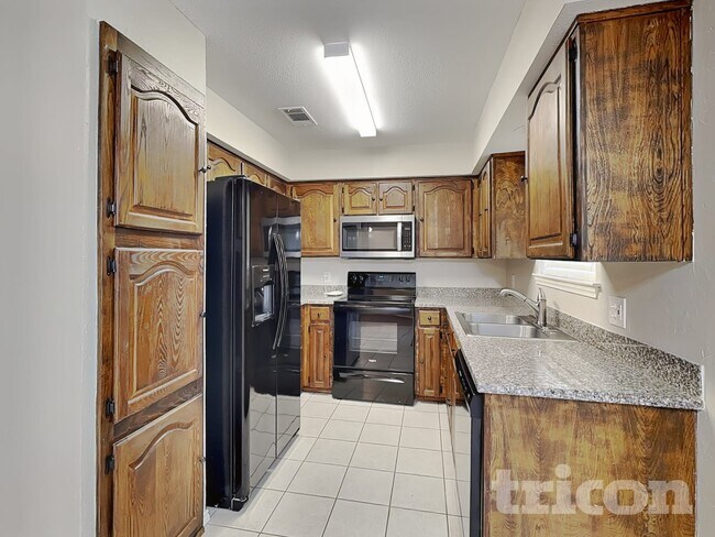 Building Photo - 5708 Woodsetter Ct