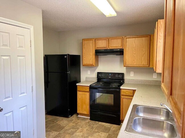 Building Photo - 7104 Merrywood Dr