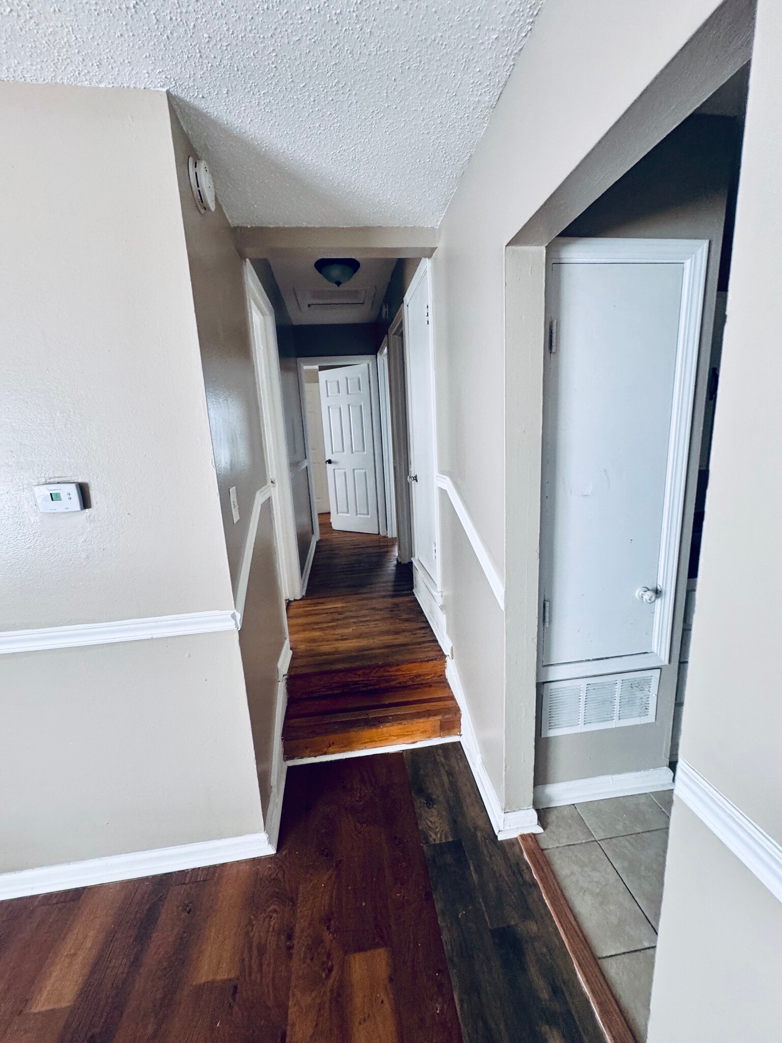 Hallway with 3 bdrms, 1 bath - 1530 Bennington Cv