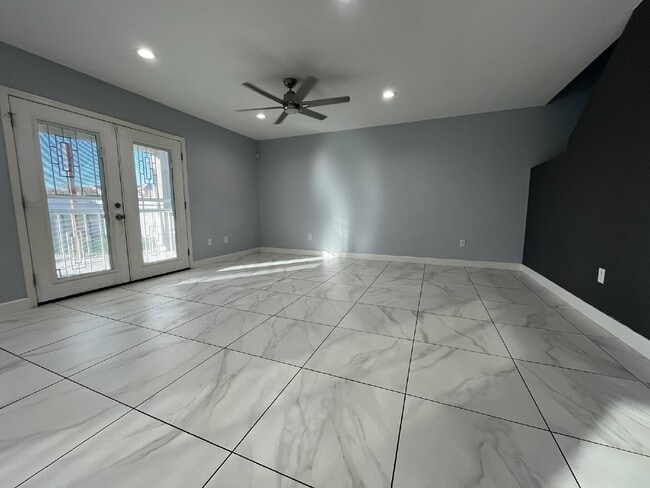 Building Photo - "Charming 4-Bed Oasis with Granite Touch & a Beautiful Pool"