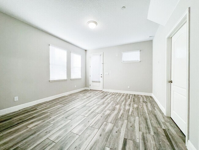 Building Photo - Luxury 4-Bedroom Townhome in Laureate Park – Now Available!