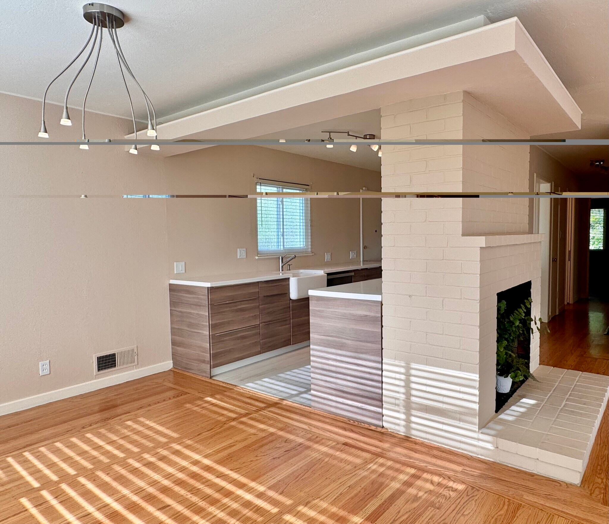 The dining area adjoins a modern galley kitchen designed for easy entertaining. - 2403 Mira Vista Dr