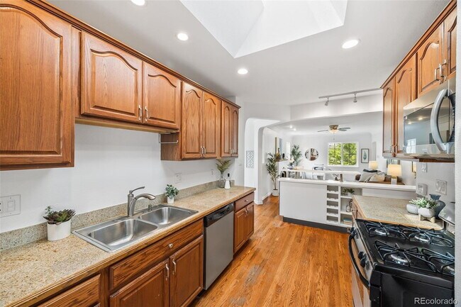 Building Photo - "Spacious 5-Bedroom Gem with Hardwood Floors & Cozy Fireplace in Denver's Heart!"