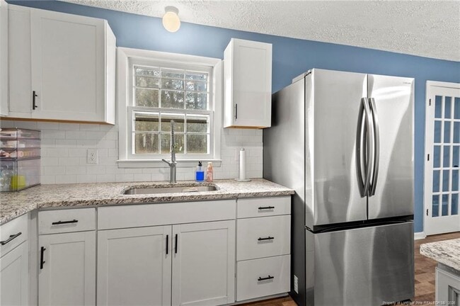 Building Photo - 5861 Columbine Rd