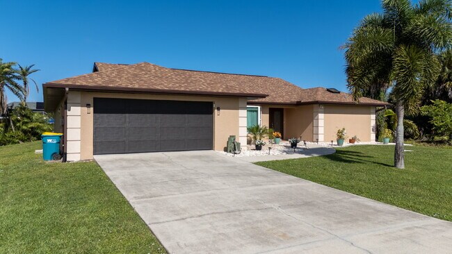 Building Photo - 3 BEDROOM • 2 BATHROOM • PRIVATE POOL • WATERFRONT • BOAT LIFT • ZERO DEPOSIT MOVE-IN AVAILABLE