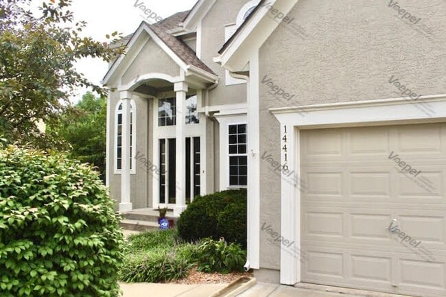 Building Photo - This Immaculate 4 Bedroom Home in Overland...