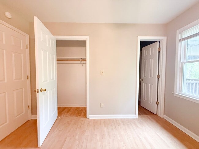 Building Photo - Spacious 3-Bedroom Home with Screened Porch, 2-Car Garage + Workshop