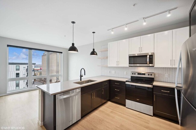 Building Photo - The Station at Malcolm Yards