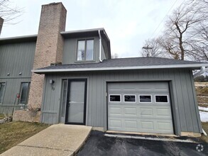 Building Photo - Quiet, Residential Townhome Community righ...