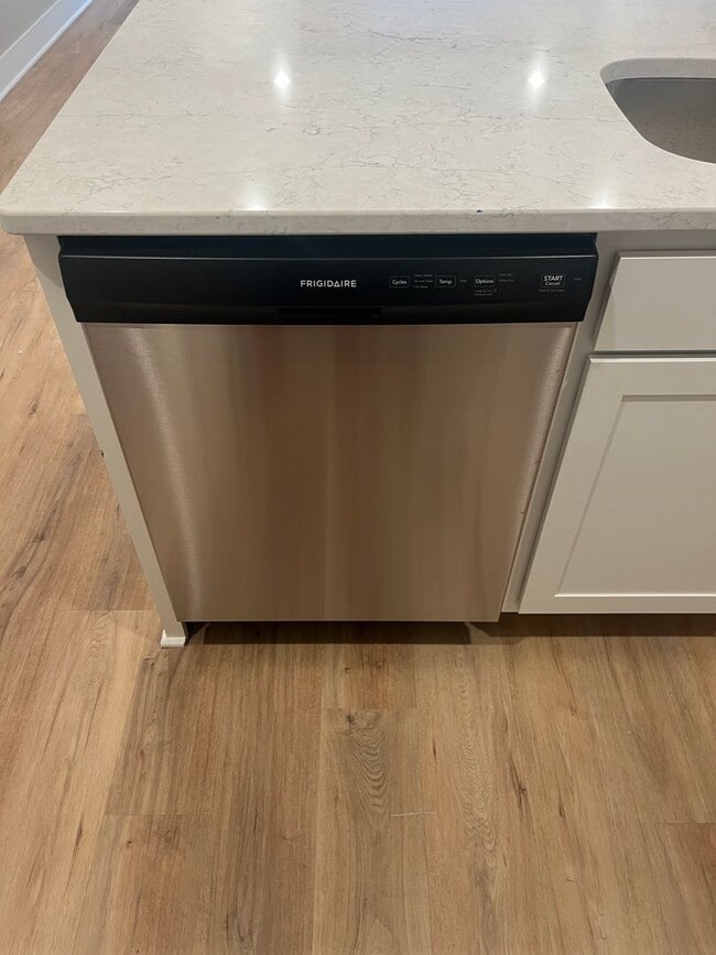 Building Photo - New Construction, 2 bed, 3 bath Row Home, with 2 car garage, fireplace, and rooftop deck!