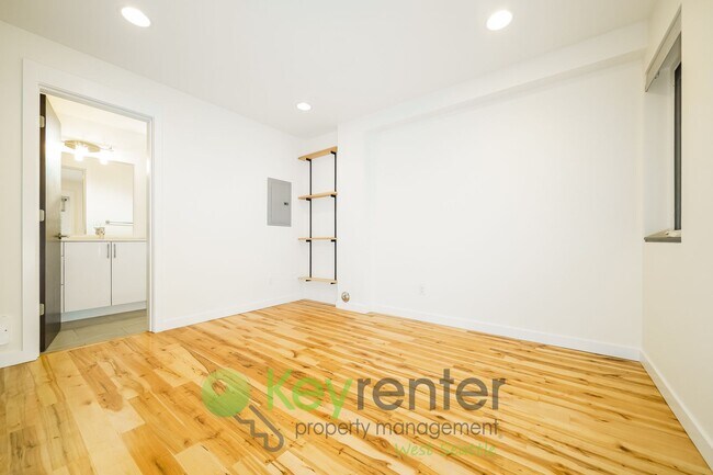 Building Photo - **Rent Special** Modern Two Bedroom Townhome with Designated Parking
