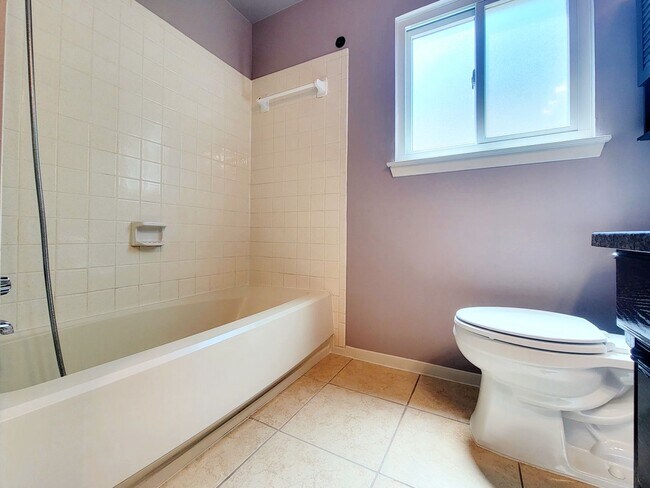 Building Photo - 3 Bed, 2 Bath Single-Level Gem with Firepl...