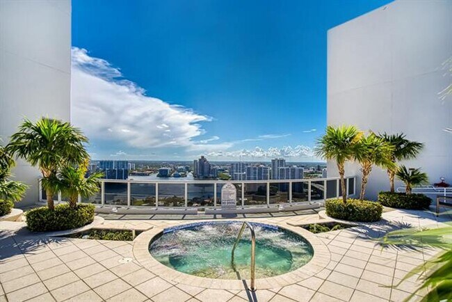 Building Photo - 18911 Collins Ave