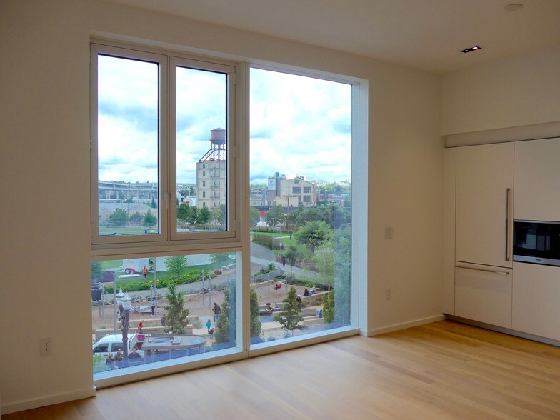 Oak floors and floor to ceiling windows - 1275 NW 10th Ave