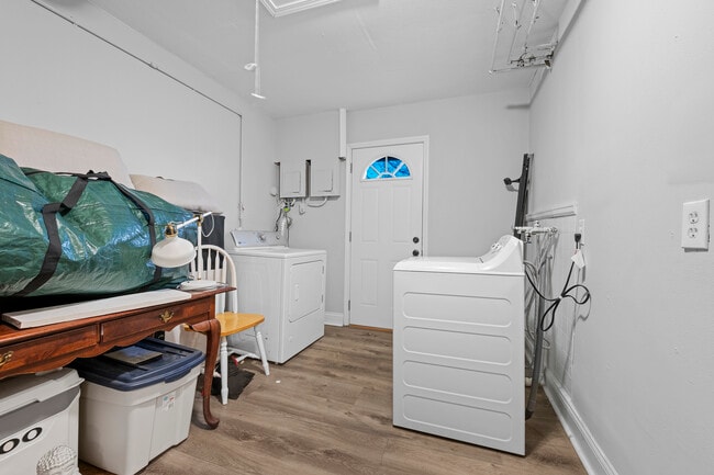 Common area between units. Shared Washer/dryer - 5903 W Park Ave