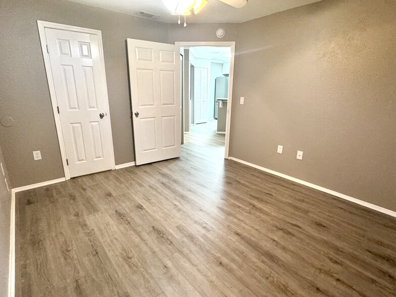 Bedroom with walk In closet behind closed door - 3705 SW 27th St