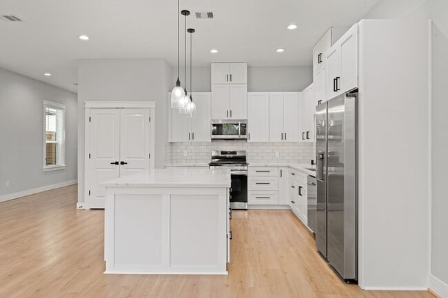 Building Photo - 6480 T C Jester Blvd