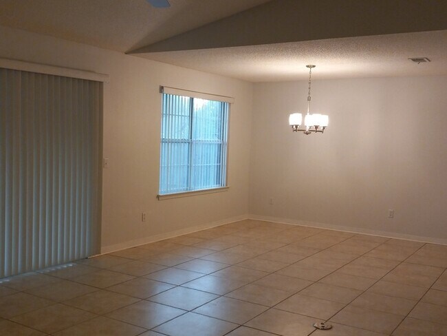 Building Photo - Large 3/2 Family Home that is Conveniently located off Blue Angel PKWY