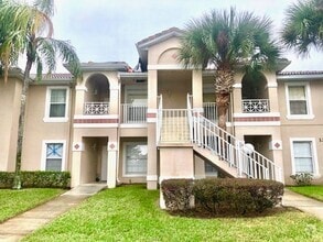 Building Photo - Nice 2X2 located on 2nd floor- Tile & lami...