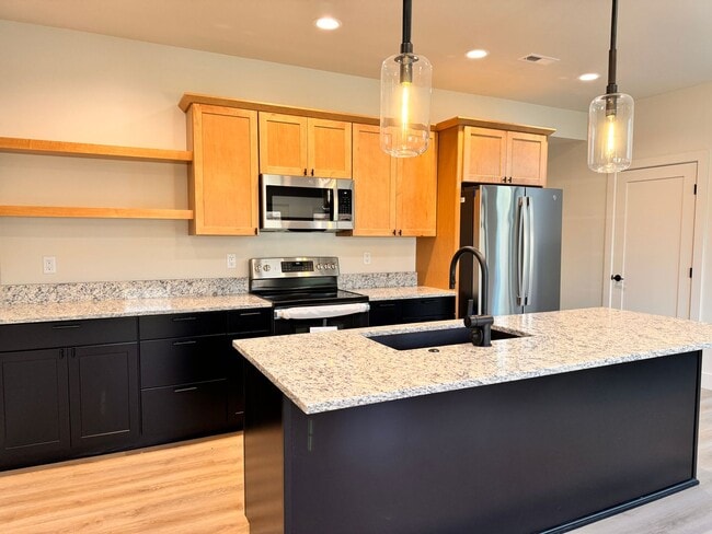 Building Photo - Modern, Spacious 3-Bedroom Townhome in the...
