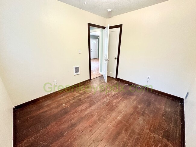 Building Photo - 2 Bedroom House with Backyard full of Frui...
