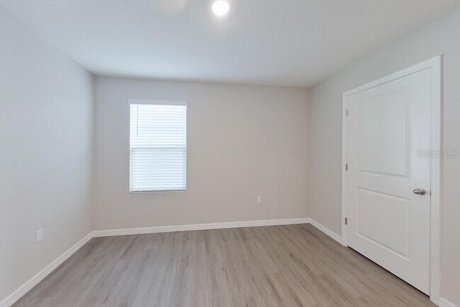 Building Photo - 8696 SW 44th Ct